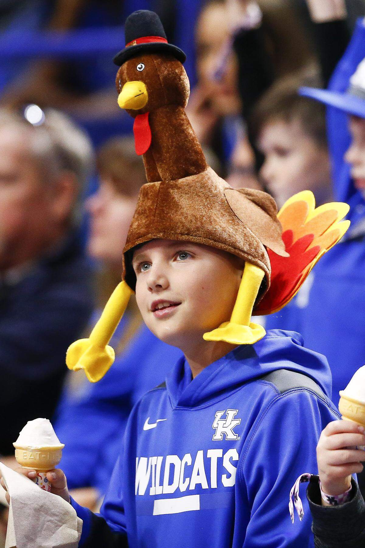Jackson Billings, 10, of Lexington geared up for the holiday by enjoying some Rupp Arena ice cream as Kentucky beat Winthrop on Wednesday afternoon.