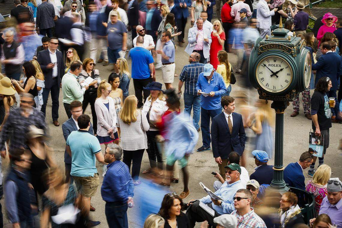 Thousands of people fled past the paddock in between races at Keeneland in Lexington Saturday, April 6, 2019.
