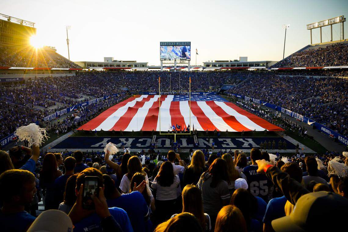 A flag is stretched across the field before a Kentucky football game at Kroger Field in Lexington, Ky., Saturday, Sept. 7, 2019.