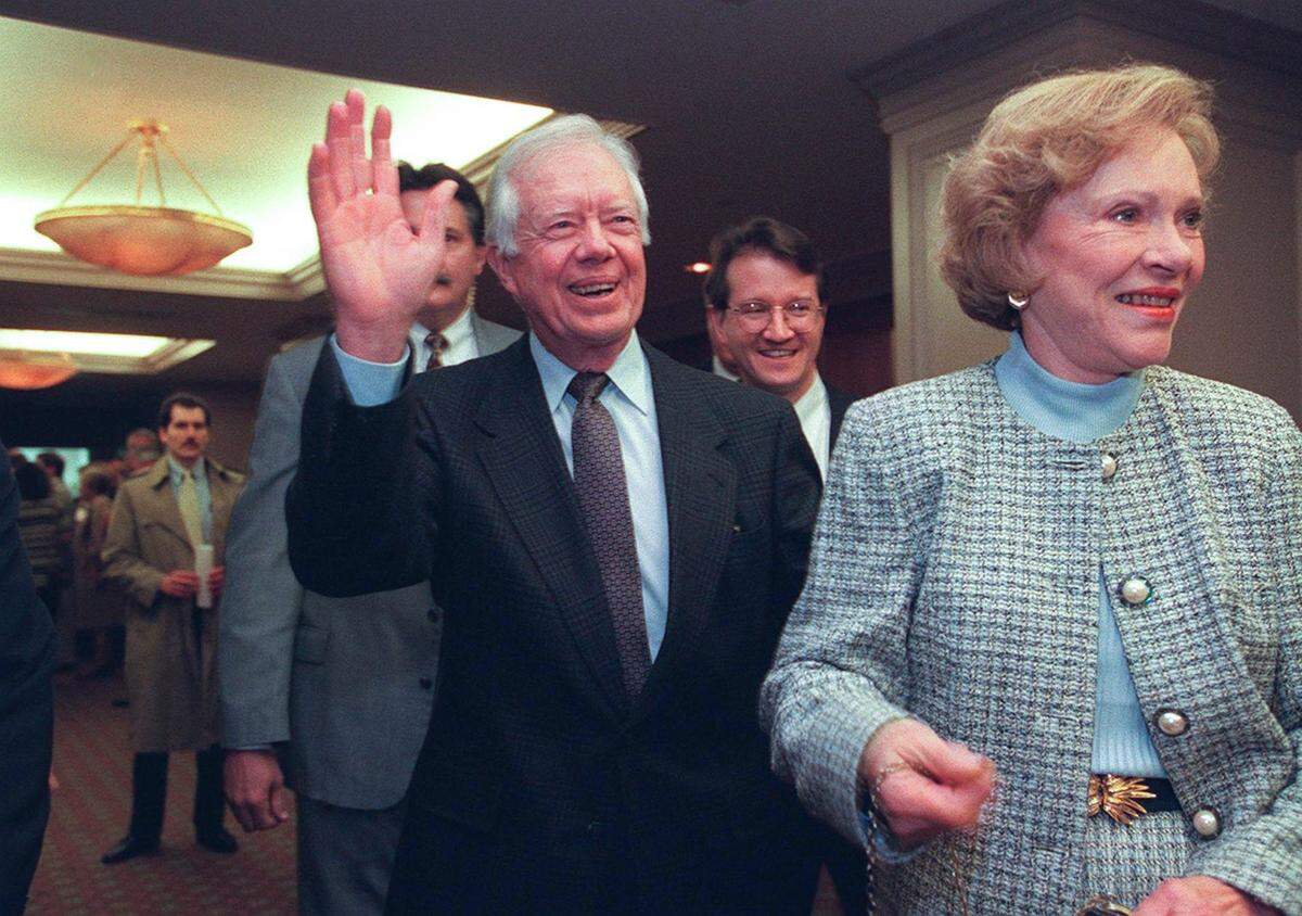 Feb. 17, 1997 -- Former President Jimmy Carter and his wife, Rosalynn, were all smiles as they arrived at the Seelbach Hotel. They later attended a fund-raising dinner for Habitat for Humanity in Louisville, Ky.Carter