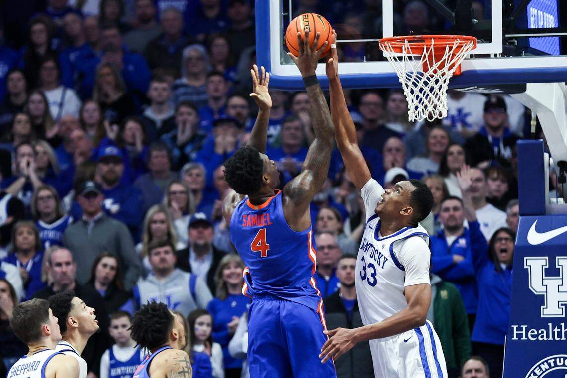 Kentucky Wildcats forward Ugonna Onyenso (33) blocks a shot by Florida Gators forward Tyrese Samuel (4) during the game at Rupp Arena in Lexington, Ky, Wednesday, January 31, 2023.