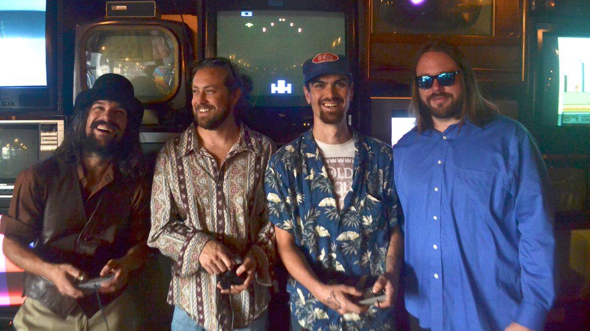 Restless Leg String Band is Jonathan Bramel, Casey Baumgardner, Ishi Wooton and Joe Schlaak.