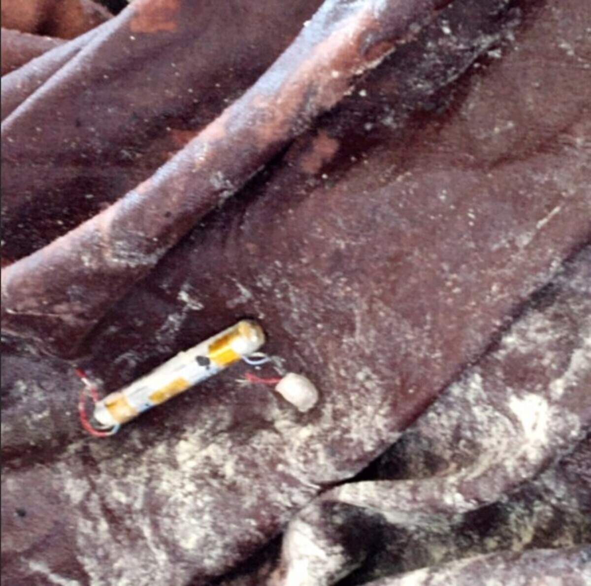 The photo depicts a battery and sheets, which are believed to be the cause of a fire inside the Daviess County Correctional Center in January.