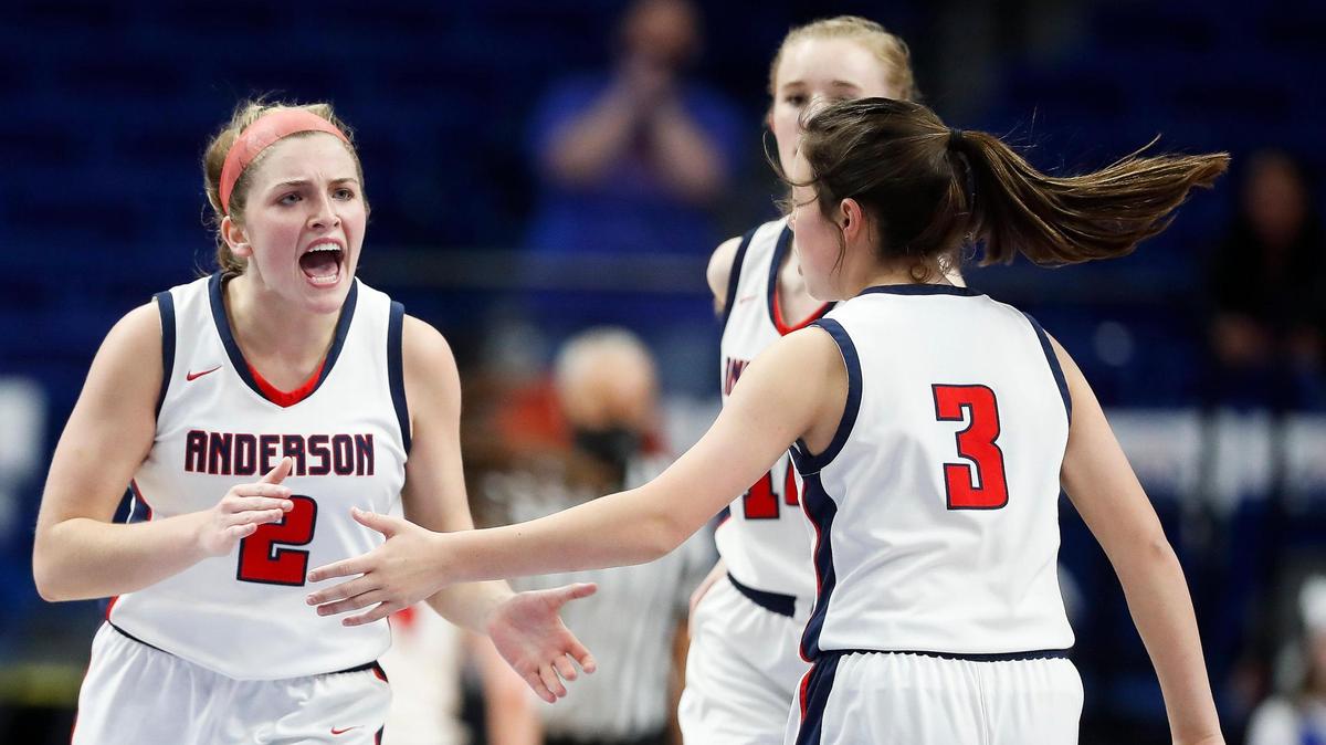 Anderson County’s Sophie Smith (2) celebrates with teammate Jenna Satterly (3) during the opening round of the KHSAA Girls’ Sweet 16 at Rupp Arena on Wednesday night. Anderson County beat Southwestern 78-67.