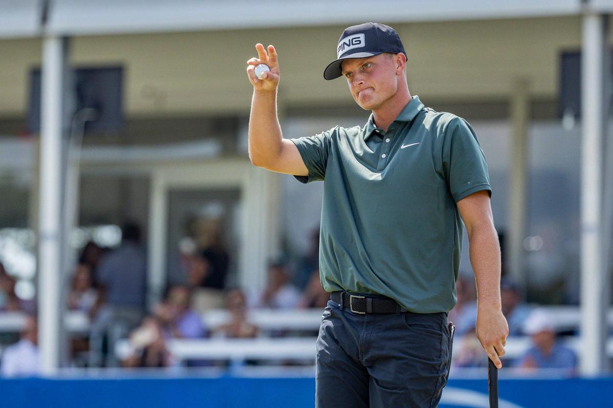 William Mouw acknowledges fans after finishing on the 18th hole during the final round of the ISCO Championship on Sunday.