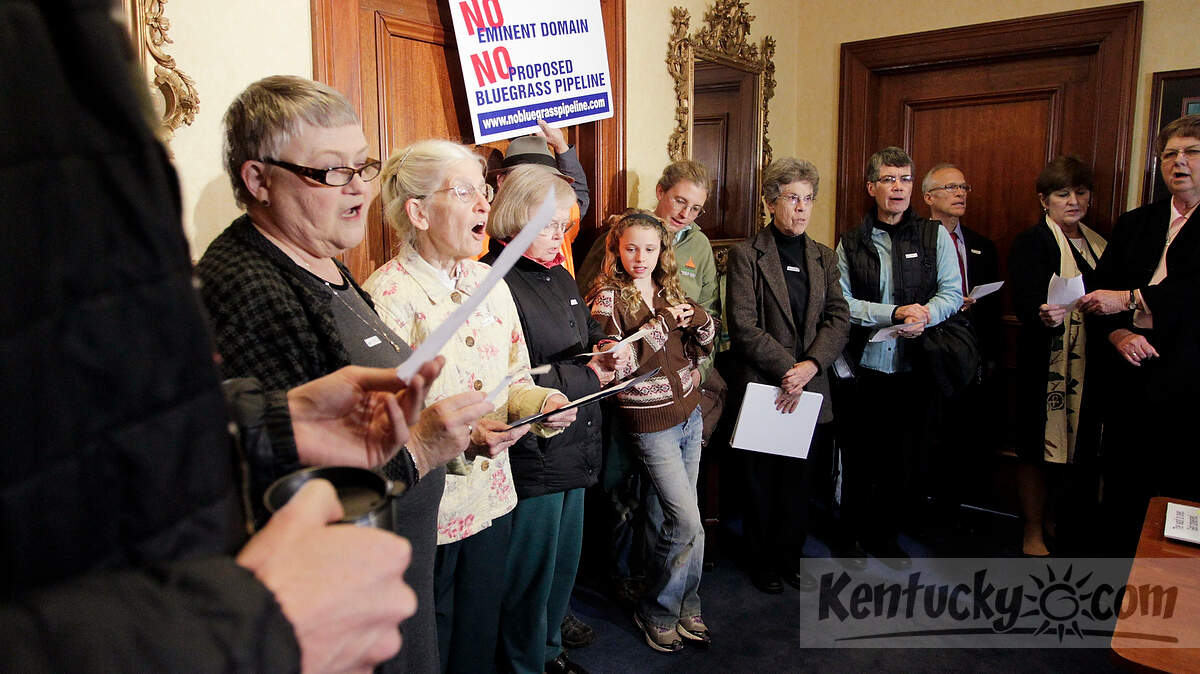 Opponents of the Bluegrass Pipeline sang "For the Beauty of the Earth" after delivering a petition to the governor's office at the Capitol in Frankfort, Ky., on Nov. 5, 2013. The petition asks Gov. Steve Beshear to ban the use of eminent domain to force the Bluegrass Pipeline through Kentucky. This was organized by Faithful America, a group that puts faith into action for social justice.The Photo by Pablo Alcala | Staff 