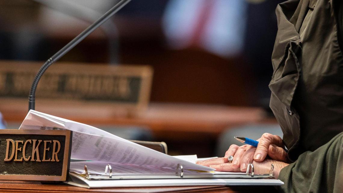 Rep. Jennifer Decker speaks and listens to comments on HB 470 at the Capitol in Frankfort, Ky., Thursday, March 2, 2022.