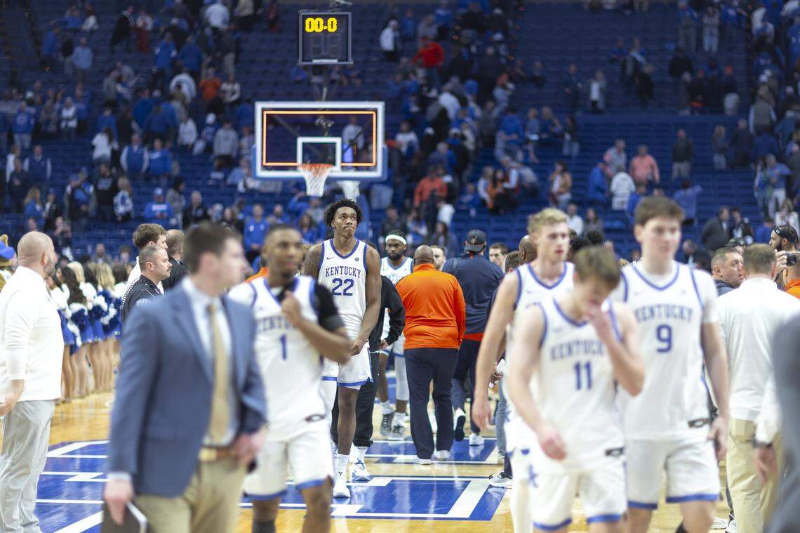 Kentucky center Amari Williams (22) walks off the court with his team following Saturday’s loss to Auburn at Rupp Arena.
