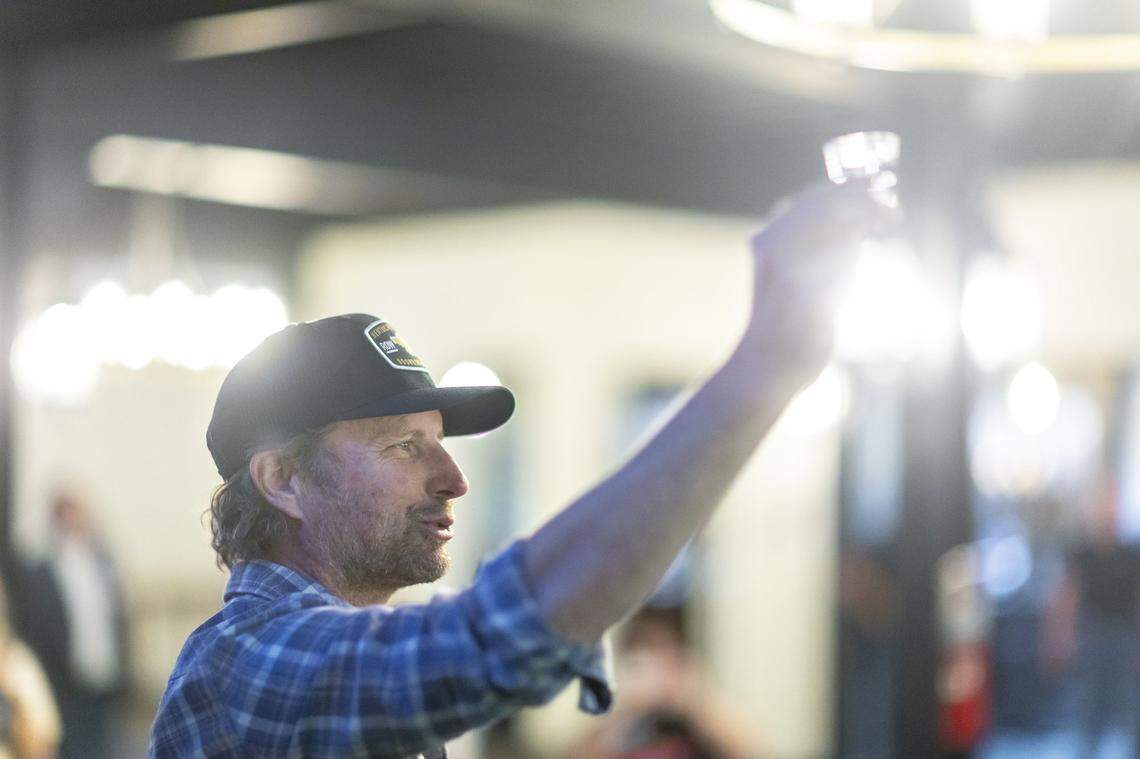 Country musician Dierks Bentley offers a toast at a release party for his Row 94 Full Proof bourbon at Green River Distillery in Owensboro, Ky., on Wednesday, Sept. 24, 2025.