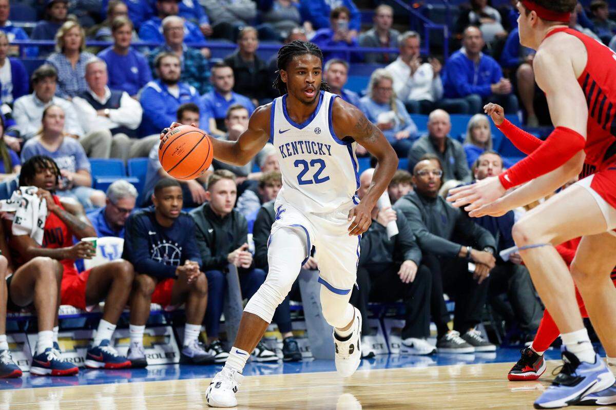 Kentucky guard Cason Wallace (22) dribbles against the Duquesne Dukes during Friday’s game at Rupp Arena.