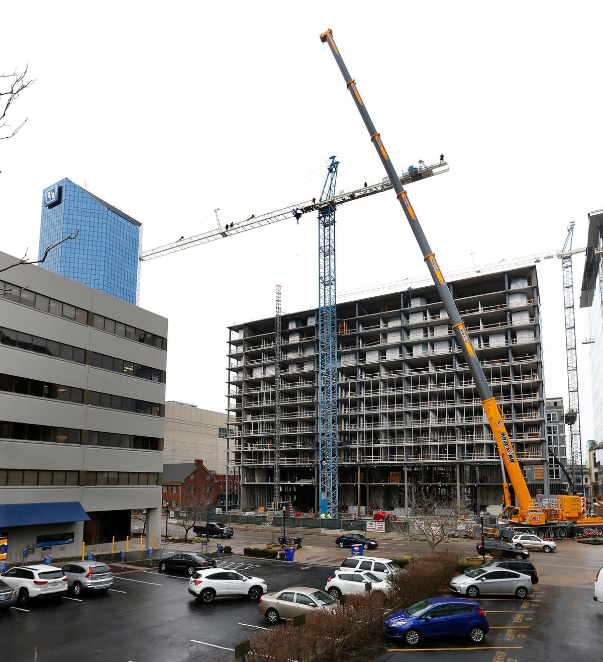 Crews worked Thursday disassembling a tower crane that has been on the site of the City Center development for four years. The crane, which is one of two that have been used during the construction, is coming down as work on Lexington’s three newest buildings begins to wind down. To take down the tower crane - it’s more than 300 feet tall -they had to bring in a second, taller crane to dissemble it, said Dudley Webb, of the Webb Companies.