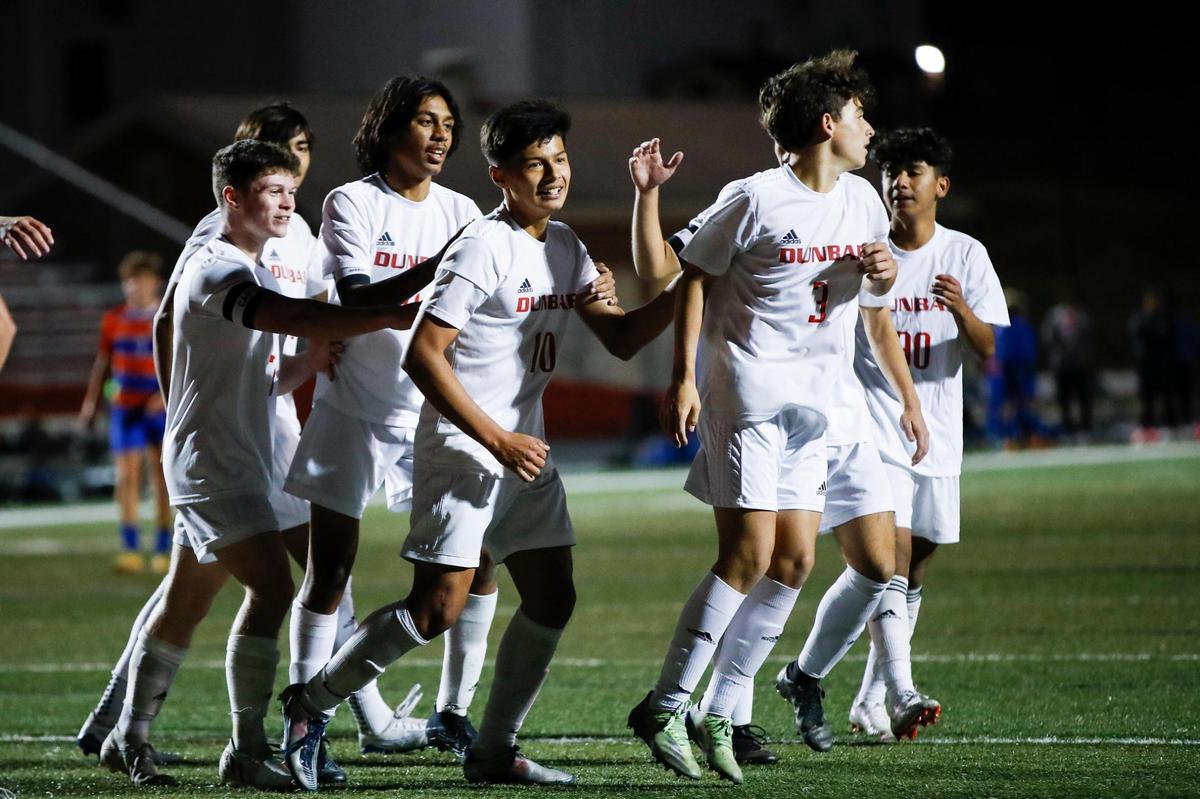 Paul Laurence Dunbar’s Joany “Gio” Chavez (10) celebrates scoring a goal with his team against Frankfort during the Boys’ 11th Region Soccer Tournament semifinals at Madison Central on Oct. 13.