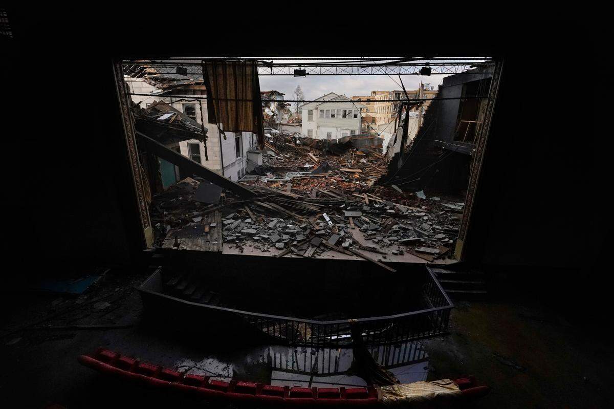 A gaping hole is all that’s left of the stage and screen at the Legion Theatre in Mayfield, Ky., Sunday, Dec. 19, 2021, more than a week after a deadly tornado tore through town on Dec. 10. Ruby Thompson remembers having to sit in the balcony because the Legion was segregated when she grew up there.