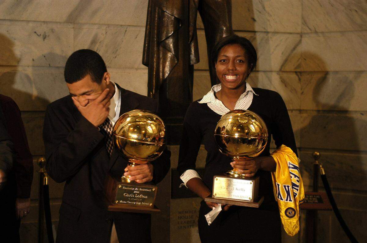 Former Mason County star Chris Lofton, left, Kentucky’s 2004 Mr. Basketball, is one of 22 winners of the award who signed with out-of-state colleges. Lofton, shown with 2004 Miss Basketball Crystal Kelly of Sacred Heart, went on to become a star at Tennessee.