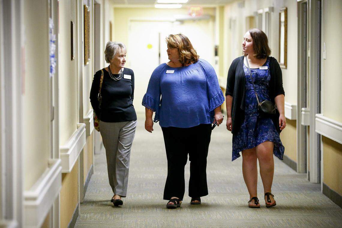 Ombudsmen Sue Landis, from left, Sherry Culp, and Denise Wells visited with patients at Brookdale Richmond Place in Lexington. The ombudsmen work for a nonprofit that monitors living conditions in nursing homes.