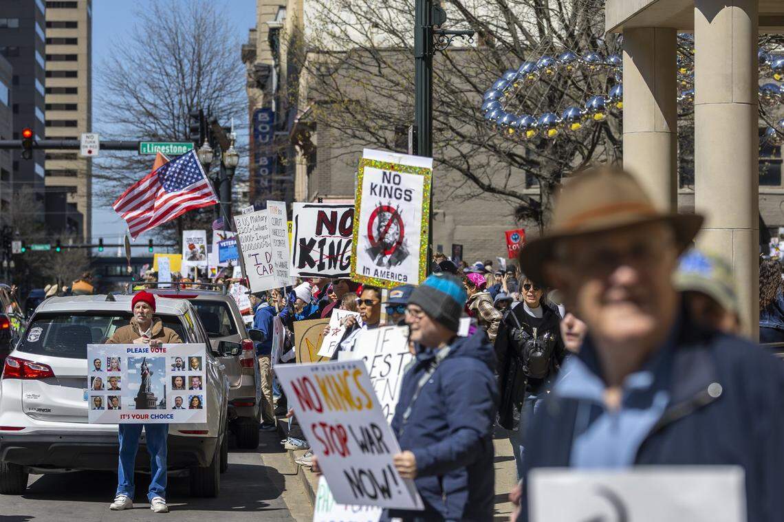People attend a rally during a No Kings protest in downtown Lexington, Ky., on Saturday, March 28, 2026. 
