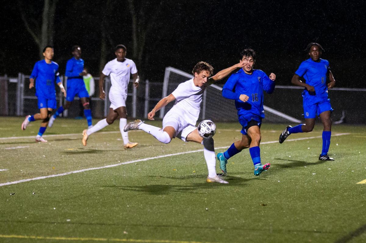 Henry Clay’s Marco Messerli (7) attempts to take a shot against Oneida Baptist during the Kentucky high school boys state soccer tournament semifinals at Paul Laurence Dunbar on Thursday. Messerli earned offensive player of the year honors from the boys coaches association.
