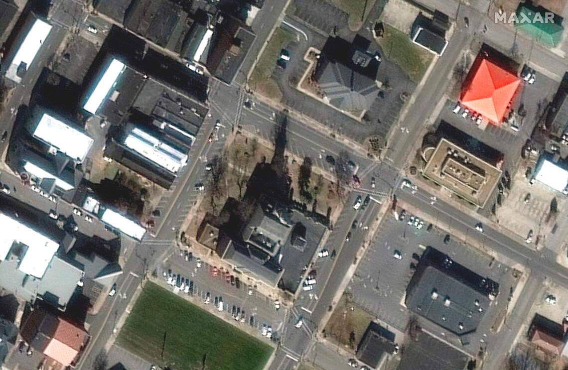 This Jan. 28, 2017, satellite photo provided by Maxar shows the county courthouse and other nearby buildings in Mayfield, Ky. Severe storms moved through the area late Friday, Dec. 10, 2021, and caused catastrophic damage across multiple states. (Satellite image ©2021 Maxar Technologies via AP)