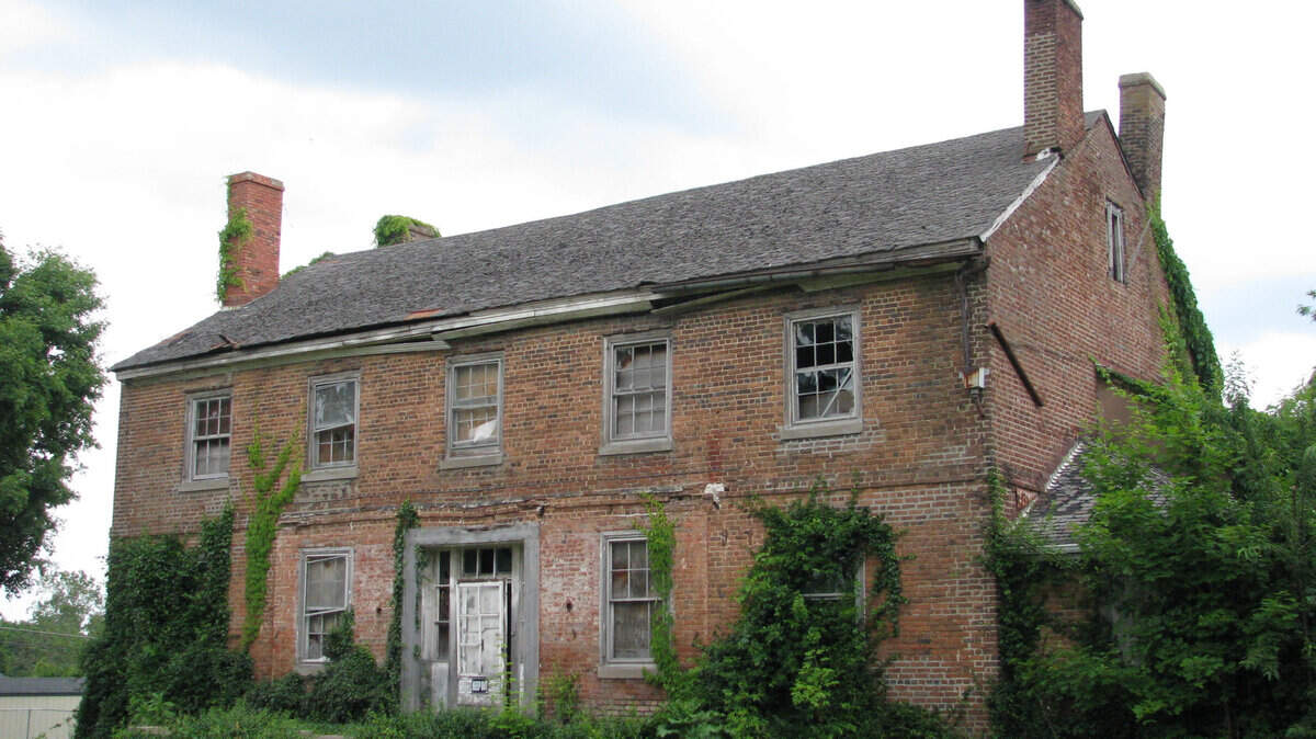 Although it is in disrepair, preservationists say the Willis Green house in Danville is structurally sound. Built in 1800, it is surrounded by residential subdivisions on the city's south side. It will be sold at absolute auction on Saturday, June 8. Photo taken on Wednesday, June 5. Photo by Greg Kocher | Staff

gkocher1@herald-leader.com