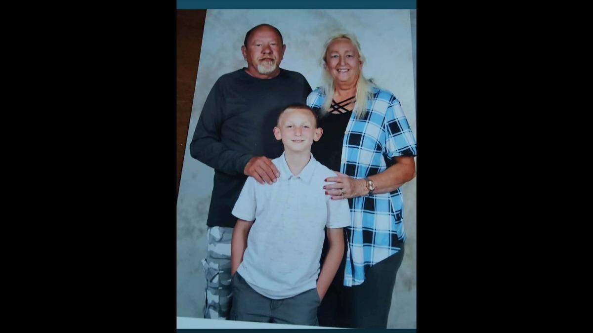 Anthony and Janet Rutherford with their grandson, Kingston.