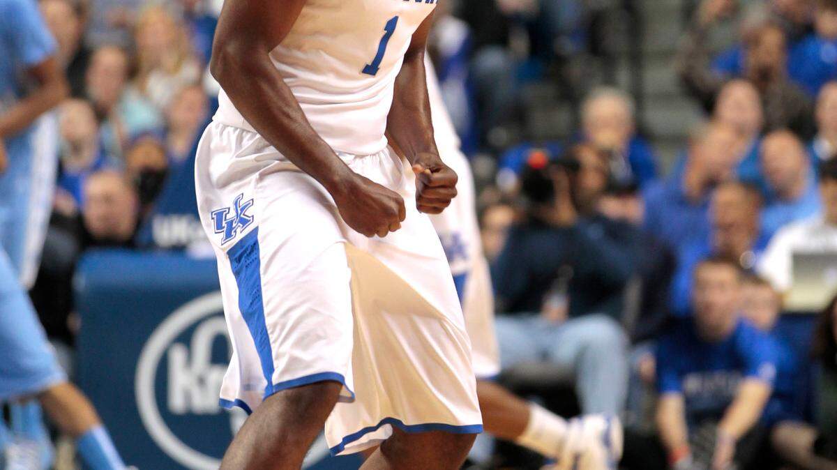 Kentucky guard Darius Miller (1) reacts to hitting a shot as #1 Kentucky played #5 North Carolina in the first half   on Saturday December 3, 2011  in Lexington, Ky.