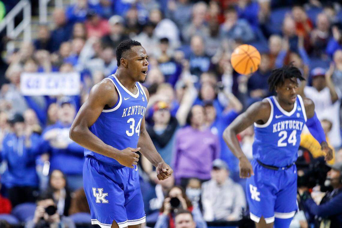 Kentucky forward Oscar Tshiebwe (34) celebrates scoring against Kansas State during Sunday’s second-round NCAA Tournament game in Greensboro, N.C.