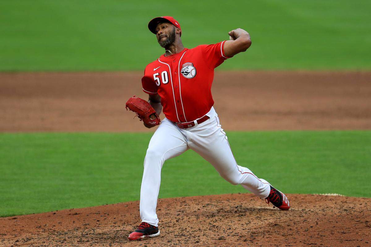 Cincinnati Reds’ Amir Garrett (50) throws during an exhibition baseball game against the Detroit Tigers at Great American Ballpark in Cincinnati, Tuesday, July 21, 2020. The Reds won 9-7. (AP Photo/Aaron Doster)