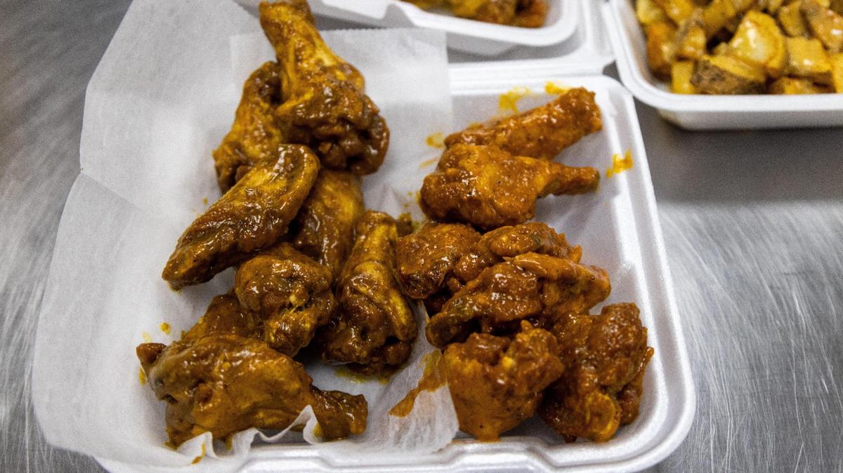 Dirt Bowl Classic wings, left, and Skywalker wings, right offered from Wing KYng on Lexington’s Southland Drive.