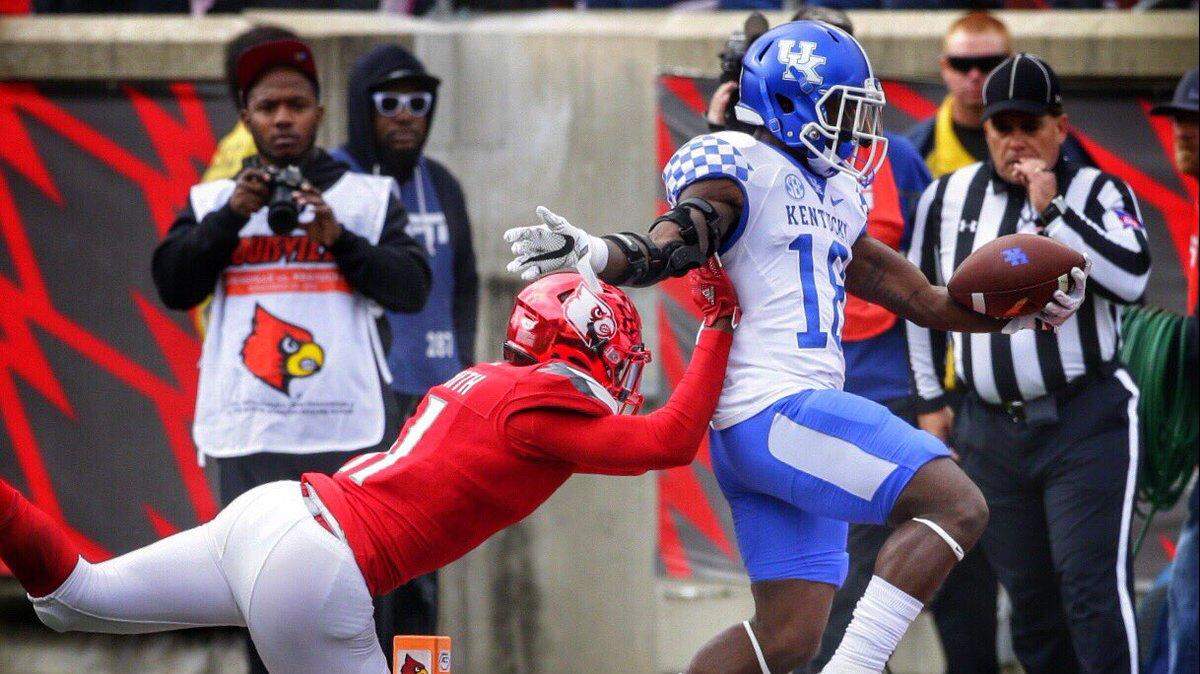 Kentucky's Boom Williams ran for a touchdown in the first quarter against Louisville on Saturday afternoon.
