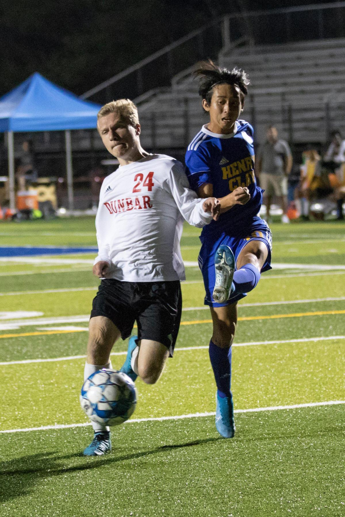 Henry Clay’s Sota Ippongi, right, met Ben Kaindu on a soccer field for the first time in a church recreational league.