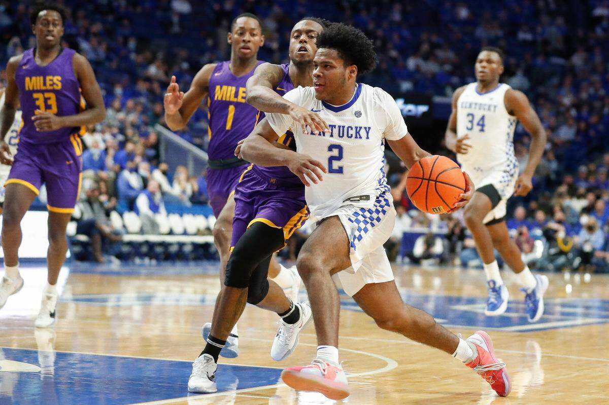 Kentucky guard Sahvir Wheeler (2) dribbled against Miles guard Roger Davis (4) during Friday’s exhibition game in Rupp Arena. UK won 80-71.