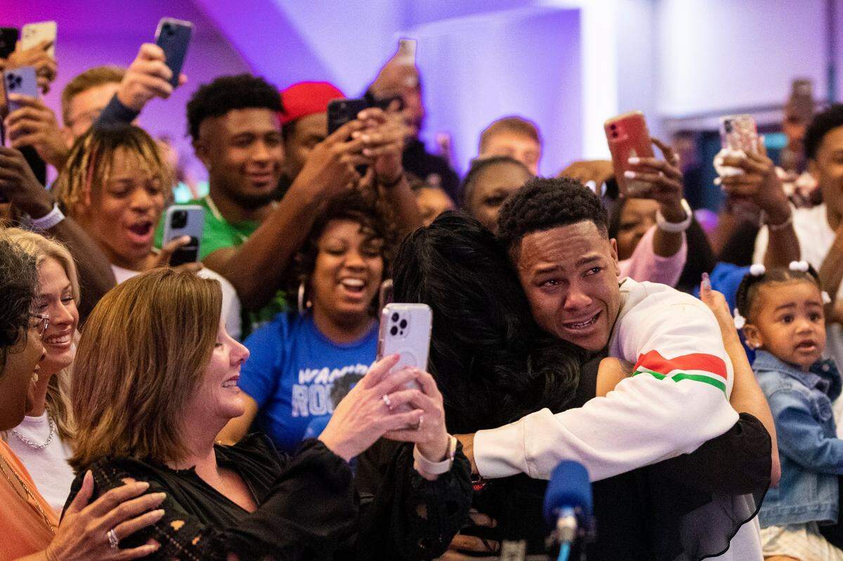 Former UK star wide receiver Wan’Dale Robinson celebrates during a watch party at the Griffin Gate Marriott in Lexington after getting a call from the New York Giants letting him know that to would be the 43rd pick of the 2022 NFL Draft on Friday night.