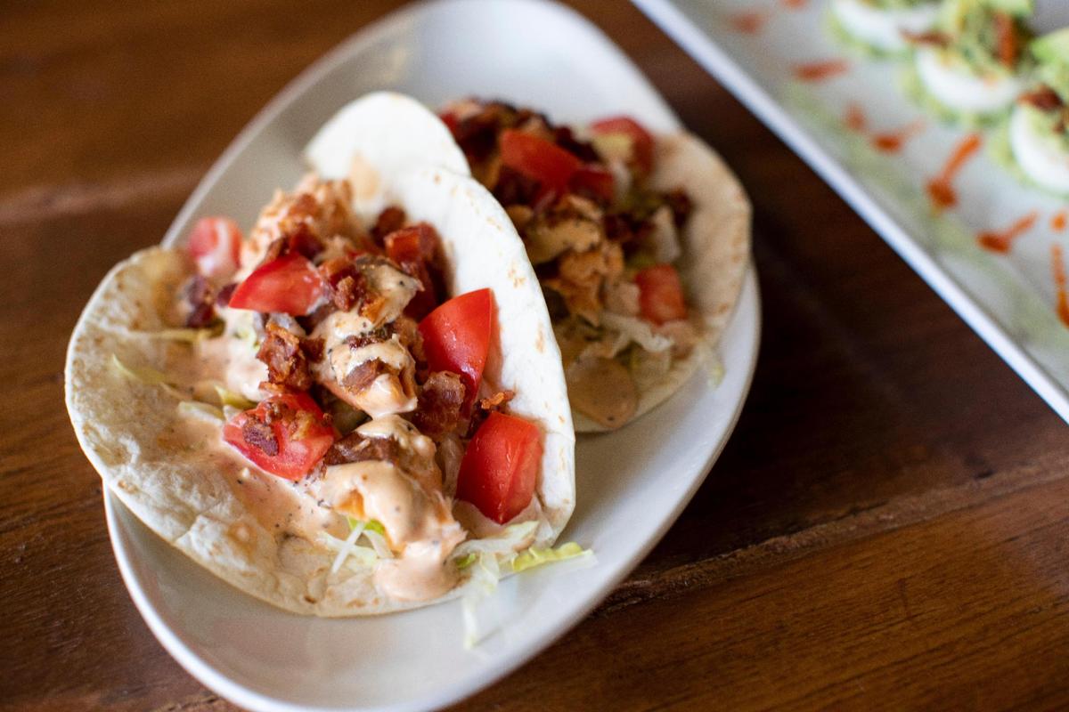 The Salmon BLT Taco Basket from the Wrigley Taproom in Corbin, Ky., Wednesday, June 16, 2021. The BLT Taco Basket includes bourbon brined smoked salmon, lettuce, tomato, bacon, sriracha aioli in a tortilla.