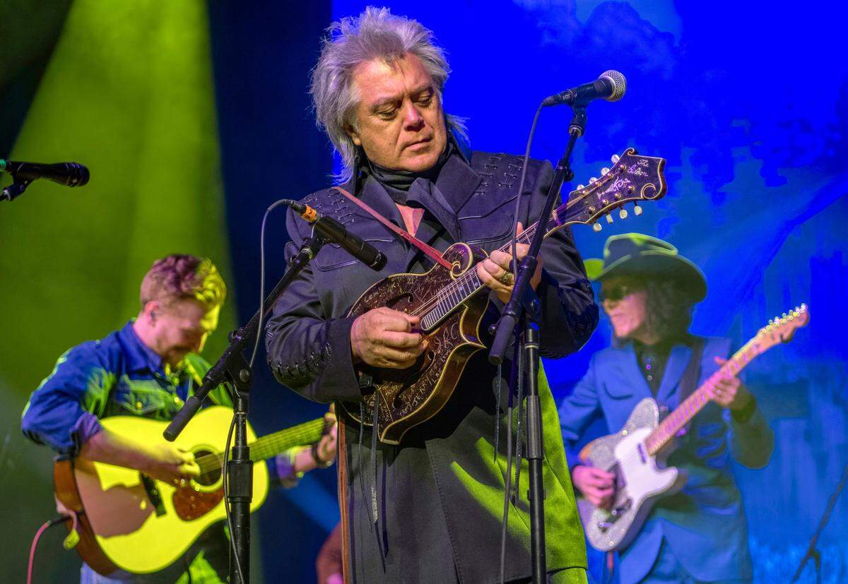 Marty Stuart, center, joined Lawrence County, Ky. native Tyler Childers, left, onstage Friday, Feb. 7, 2020, at the Ryman Auditorium in Nashville, Tenn. Childers is in the middle of a two-weekend residency on the famous stage. Stuart and his band also opened for Childers.