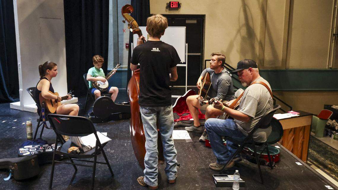 Students take class at Leeds Center For The Arts’ Bluegrass University, a program aimed at nurturing young bluegrass musicians, Monday, Sept. 15, at the Leeds Center For The Arts in Winchester, Ky. There are four students in the inaugural class led by seasoned bluegrass musicians Jayd Raines, at right, and Zac Combs, second from right. 