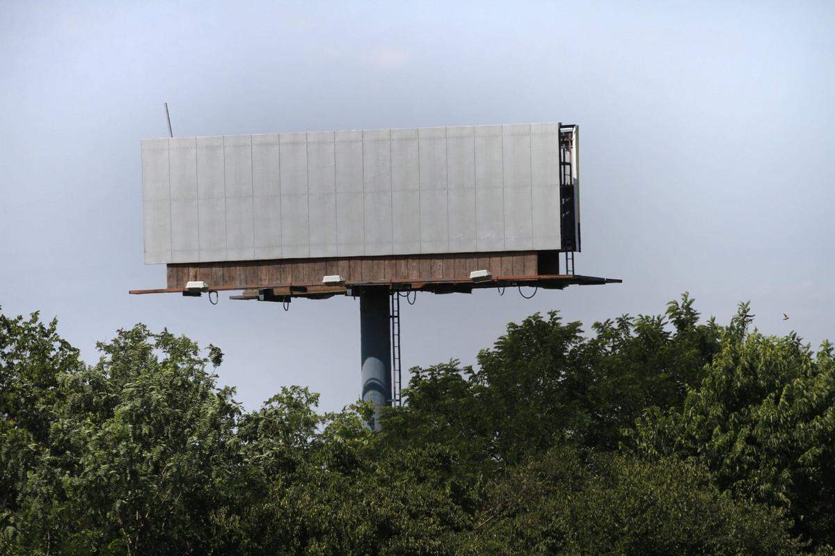 A blank billboard, photographed on Thursday, May 31, 2012 on New Circle Rd. near the Leestown Rd. exit, in Lexington, Ky., is the site of a stolen billboard message. Lexington police are investigating the disappearance of a controversial billboard message that denounced homosexuality and abortion. The billboard on New Circle Road first appeared last week and cited Bible passages beneath the statements “Homosexuality is an abomination” and “Abortion is murder.” The billboard, which listed a phone number for Bluegrass Church of Christ in Scott County, was missing Thursday morning. Police contacted the church, and took a theft report.