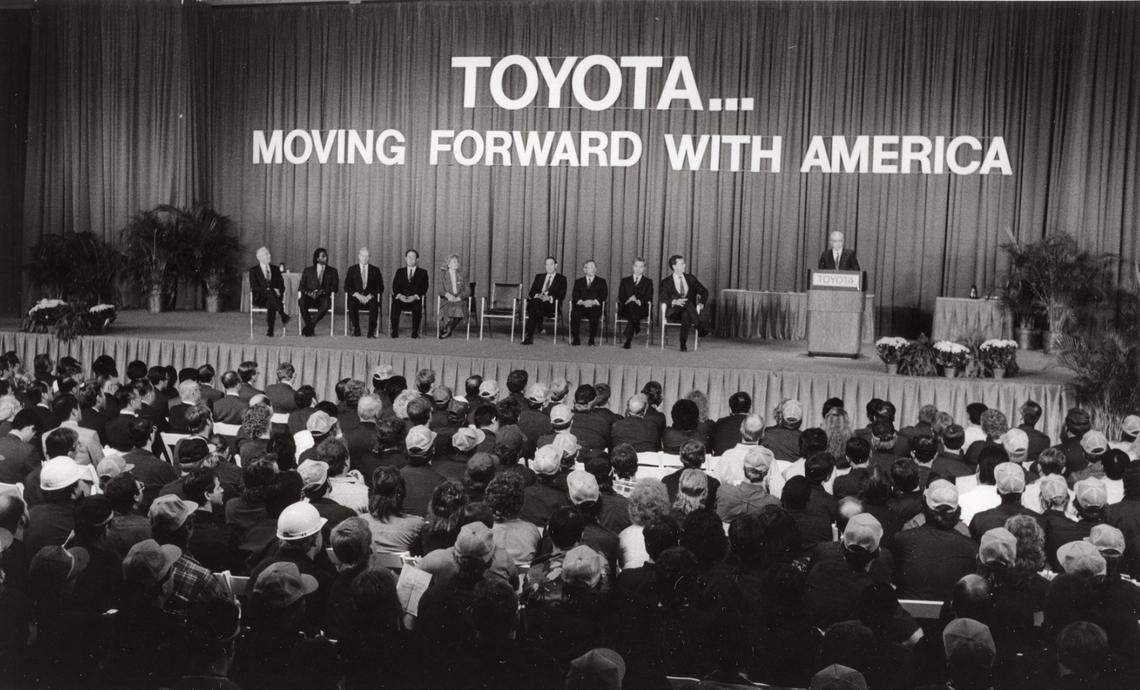 The new Toyota Motor Manufacturing plant holds its first dedication ceremony at the plant on October 6, 1988. Participants in the program included: Dr. Schoichiro Toyoda - President of Toyota Motor Corporation, Kentucky Gov. Wallace Wilkinson and former Gov. Martha Layne Collins. All the Toyota employees were invited to attend the ceremony. Speaking is Kaneyyoshi Kusunoki - President of Toyota Motor Manufacturing, U.S.A. Inc. Charles Bertram/Lexington Herald-Leader. 