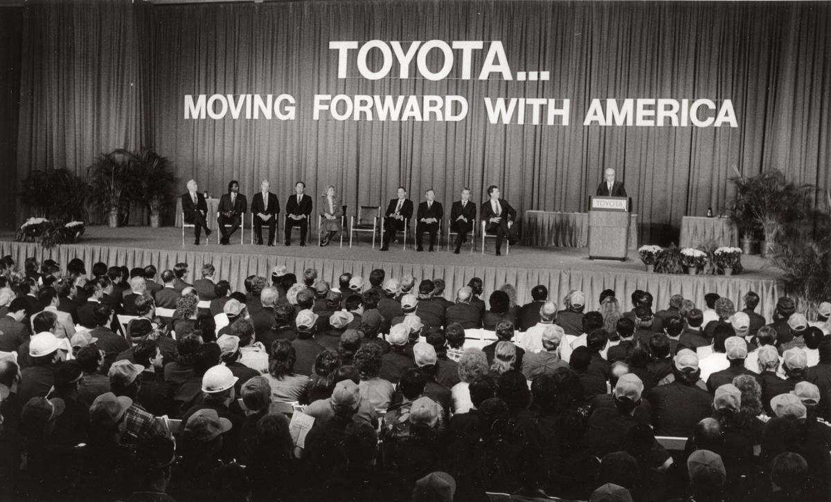 1988 HERALD-LEADER FILE PHOTO. The new Toyota Motor Manufacturing plant held their first dedication ceremony at the plant on October 6, 1988. Participants in the program included: Dr. Schoichiro Toyoda - President of Toyota Motor Corporation, Kentucky Govenor Wallace Wilkinson and former Gov. Martha Layne Collins. All the Toyota employees were invited to attend the ceremony. Speaking is Kaneyyoshi Kusunoki - President of Toyota Motor Manufacturing, U.S.A. Inc. Charles Bertram/Lexington Herald-Leader. Historical photograph.
