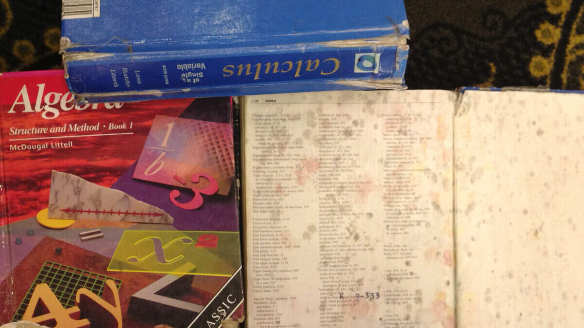Dunbar students showed educators math books currently used that had mold or were taped together. 