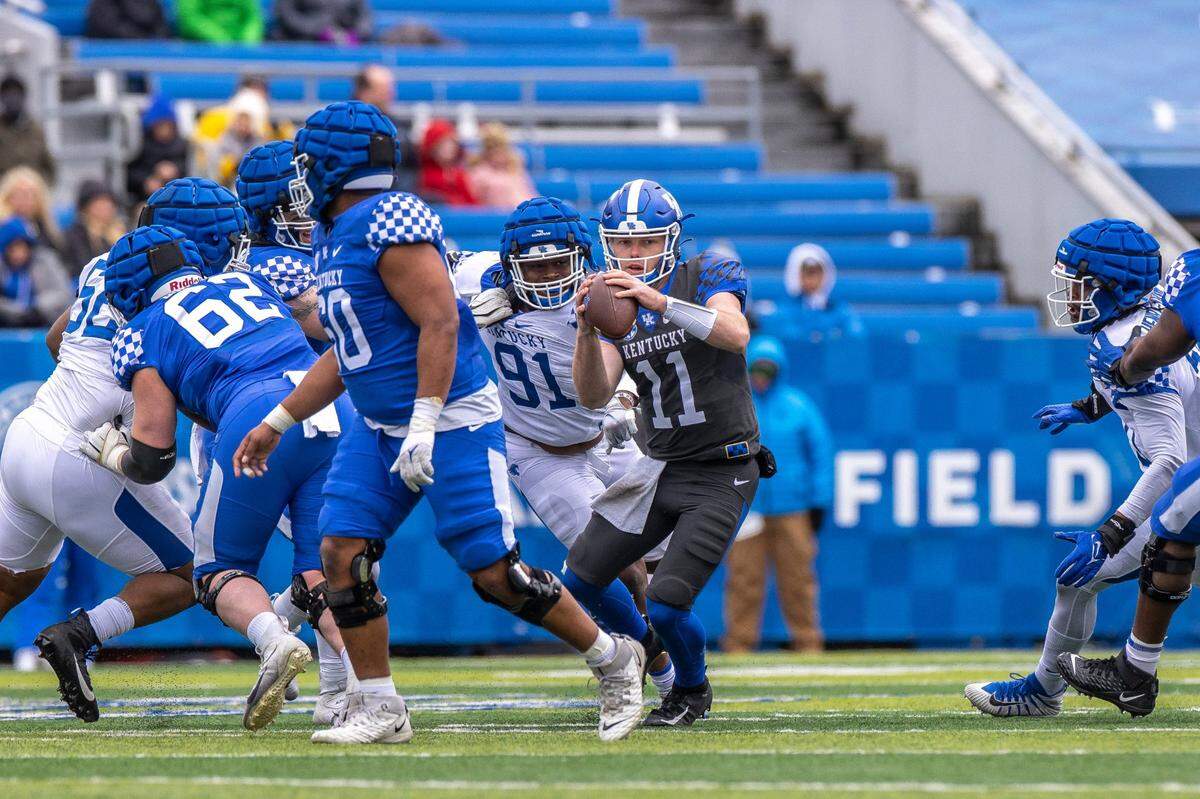 Kentucky quarterback Beau Allen (11) completed four of 11 passes for 75 yards in Saturday’s Blue-White Game. However, the former Lexington Catholic star was victimized by drops on what should have been three completions, one of which would have gone for a touchdown.