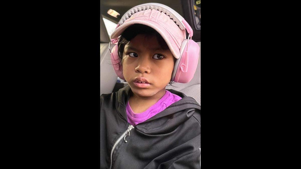 Jenny Dim, 9, was last seen Friday afternoon in Florence. Kentucky State Police said she was wearing a mint-blue jacket and pink headphones.