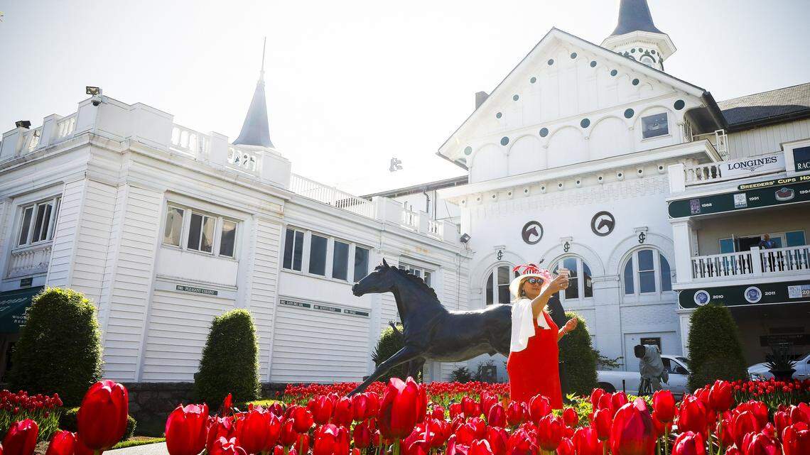 Wendy Hall of Louisville took a selfie Tuesday in front of the Aristides sculpture at Churchill Downs in Louisville. Aristides won the first Kentucky Derby in 1875 before a crowd estimated at 10,000. When the 2018 Derby gets underway Saturday, a crowd of around 160,000 is expected for the celebration of the 144th running of the Triple Crown's first leg.