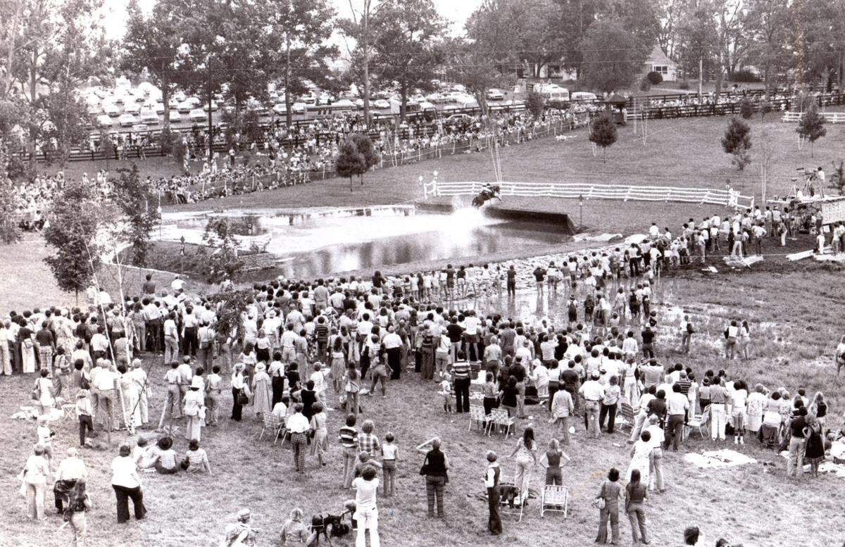 A crowd gathered at the head of the lake water jump during the cross country competition at the World Three Day event on Sept. 16, 1978, at the Kentucky Horse Park. It was the first year that the event, now known as the Land Rover Kentucky Three-Day Event, was held in Kentucky.