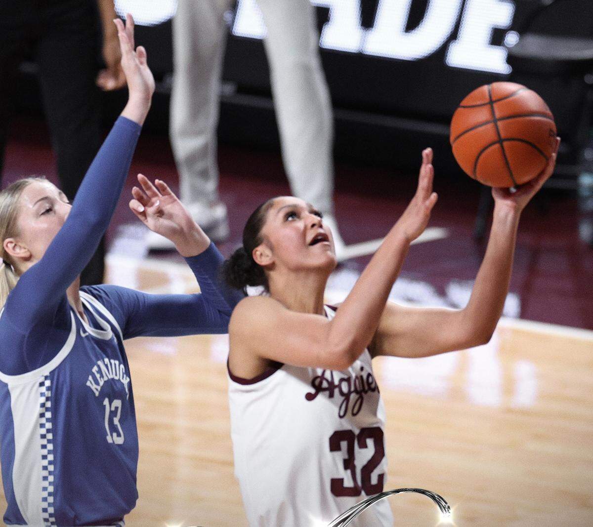 Kentucky’s Clara Strack tries to block a shot by Texas A&M’s Lauren Ware on Thursday night. The Wildcats entered the game leading the nation in shots blocked per game but did not block any shots in College Station. Strack battled foul trouble throughout and finished with six points on 2-for-12 shooting.