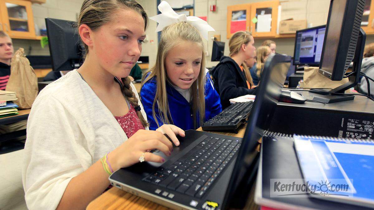Abby Schweighardt, left, and Abby Rawls, right,  both 13-years-old, worked on a climate change project in Patrick Goff's 8th grade integrated science class at Beaumont Middle School in Lexington, Ky., Thursday, November 01, 2012. Statewide test scores were released today. Beaumont Middle finished in the distinguished category, but was also classified as a Focus school based on its Gap score. Photo by Charles Bertram | Staff