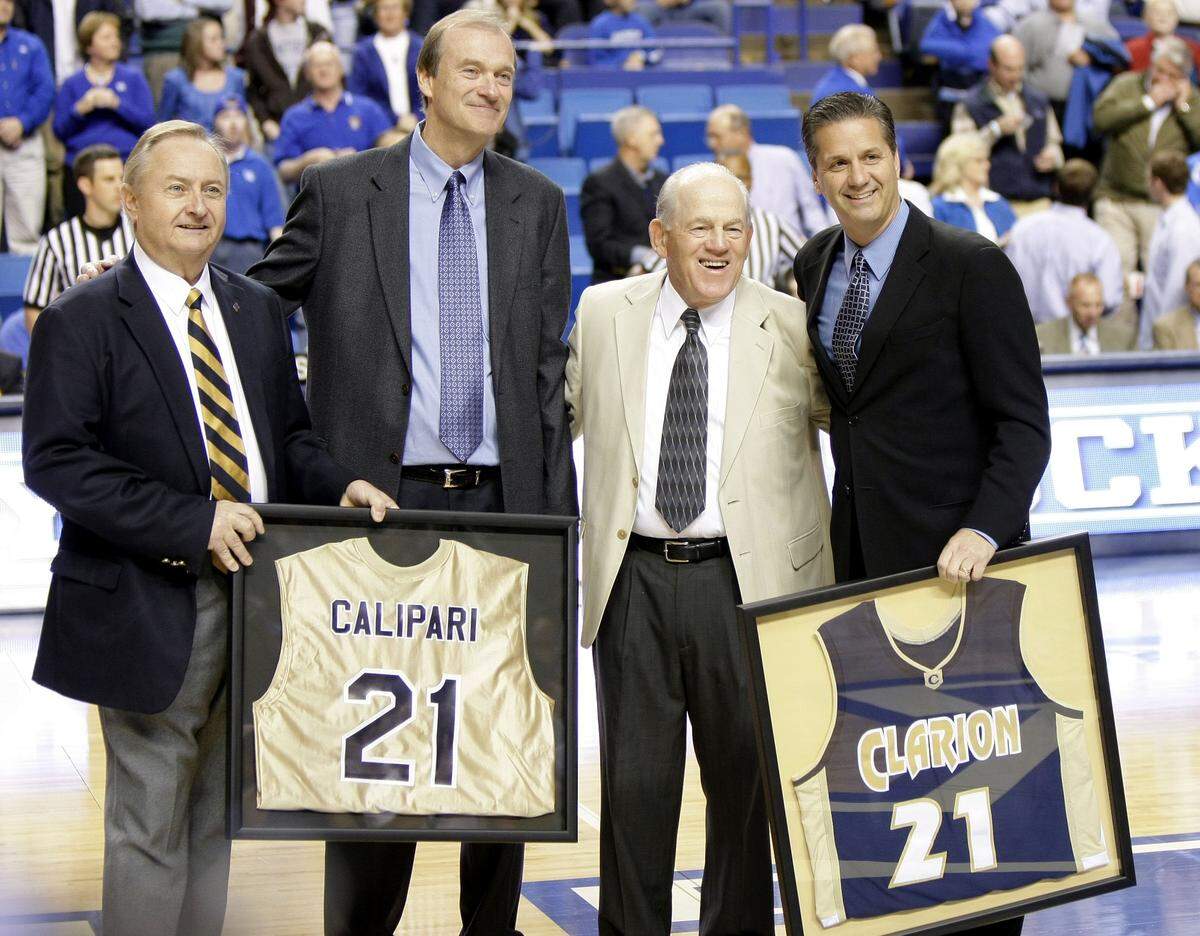 UK Coach John Calipari, right, stood with his coach at Clarion, Joe DeGregorio, second from right, along with his high school coach, Bill Sacco, left, and Clarion coach Ron Righter before Kentucky played Clarion in an exhibition game during Calipari’s first season in Lexington