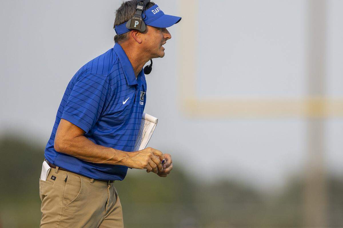 Danville's head coach Steve Stonebraker talks to his players during a game in Lawrenceburg, Ky., on Friday, Sept. 5, 2025.