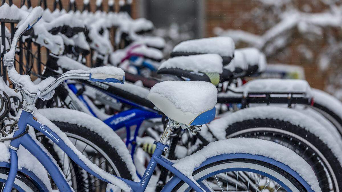 Snow covers bicycles outside R.H. White Hall on the Murray State University Campus in Murray, Ky., Friday, Jan. 10, 2025.
