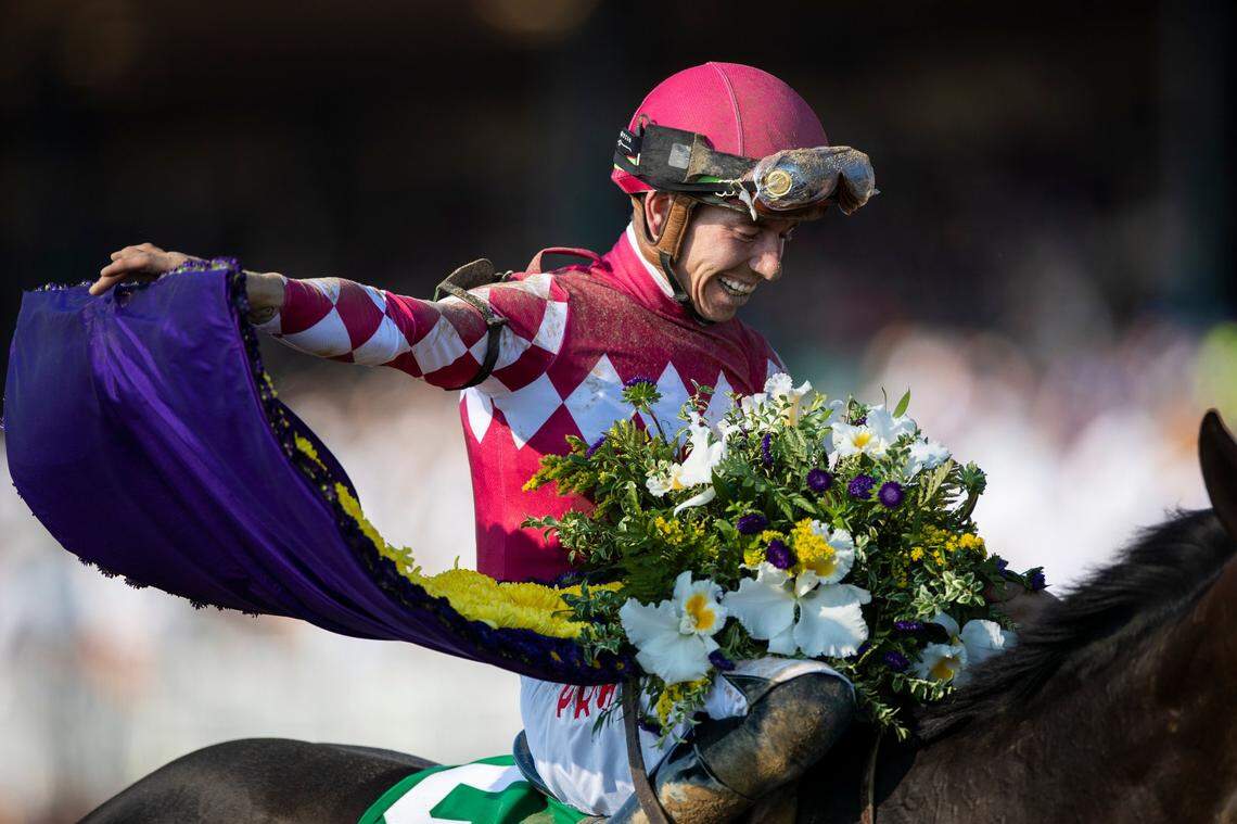 Tyler Gaffalione receives the winner’s garland after winning the Breeders’ Cup Juvenile Fillies aboard Wonder Wheel at Keeneland on Friday.