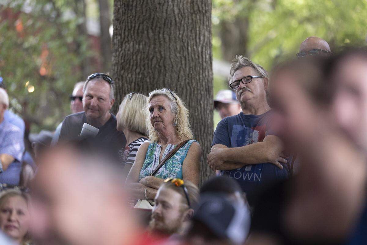 Spectators listen during the political speaking at the 145th annual St. Jerome Fancy Farm Picnic in Fancy Farm, Ky., on Saturday, Aug. 2, 2025.